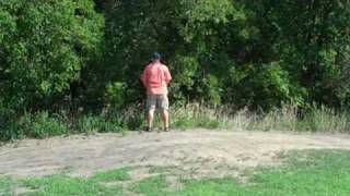Jeffrey Reilly takes a pee on the golf course