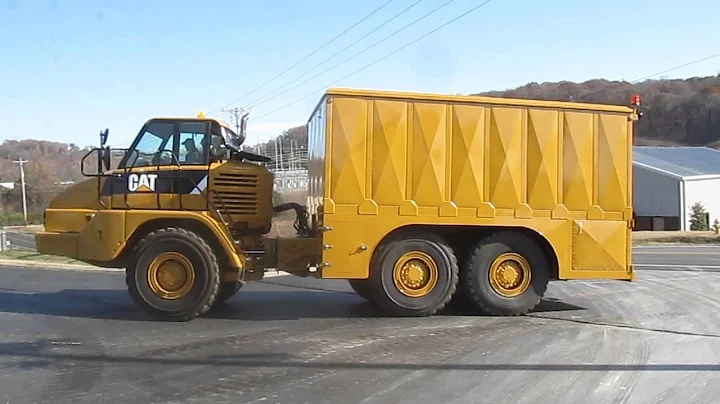 Caterpillar 730 articulated truck with HEC built PM Lube Body