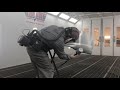 Spraying silver Ford Fusion bumper with Lesonal Waterborne