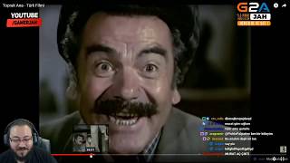 Jahrein  yeşilçam filmi izlerken gülme krizine giriyor