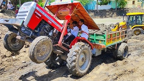 Massey Ferguson 7250 tractor fully loaded mud by JCB 3dx machine