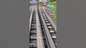 Bus is changing from the road to the "rails" on Adelaide Bus o-bahn