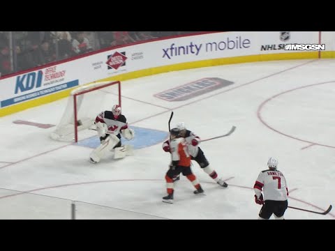 Bobby Brink scores a goal against the New Jersey Devils
