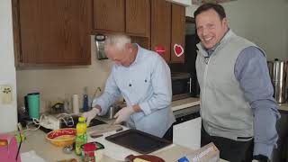 Davis teaches Mike Avery to cook