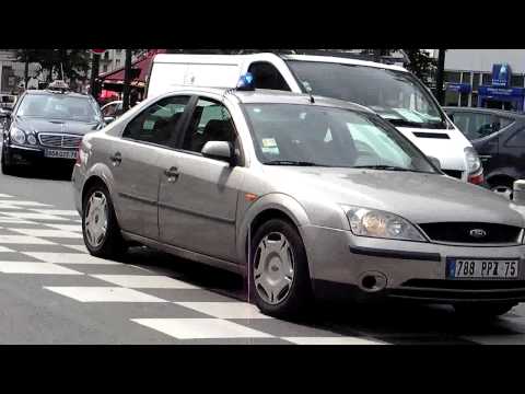 Undercover Police Car in Paris Responding Code 3 (Ford)