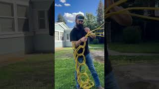 Roll your extension cord up like a pro #qtlandscape #grass #satisfying #lawncare #extensioncord
