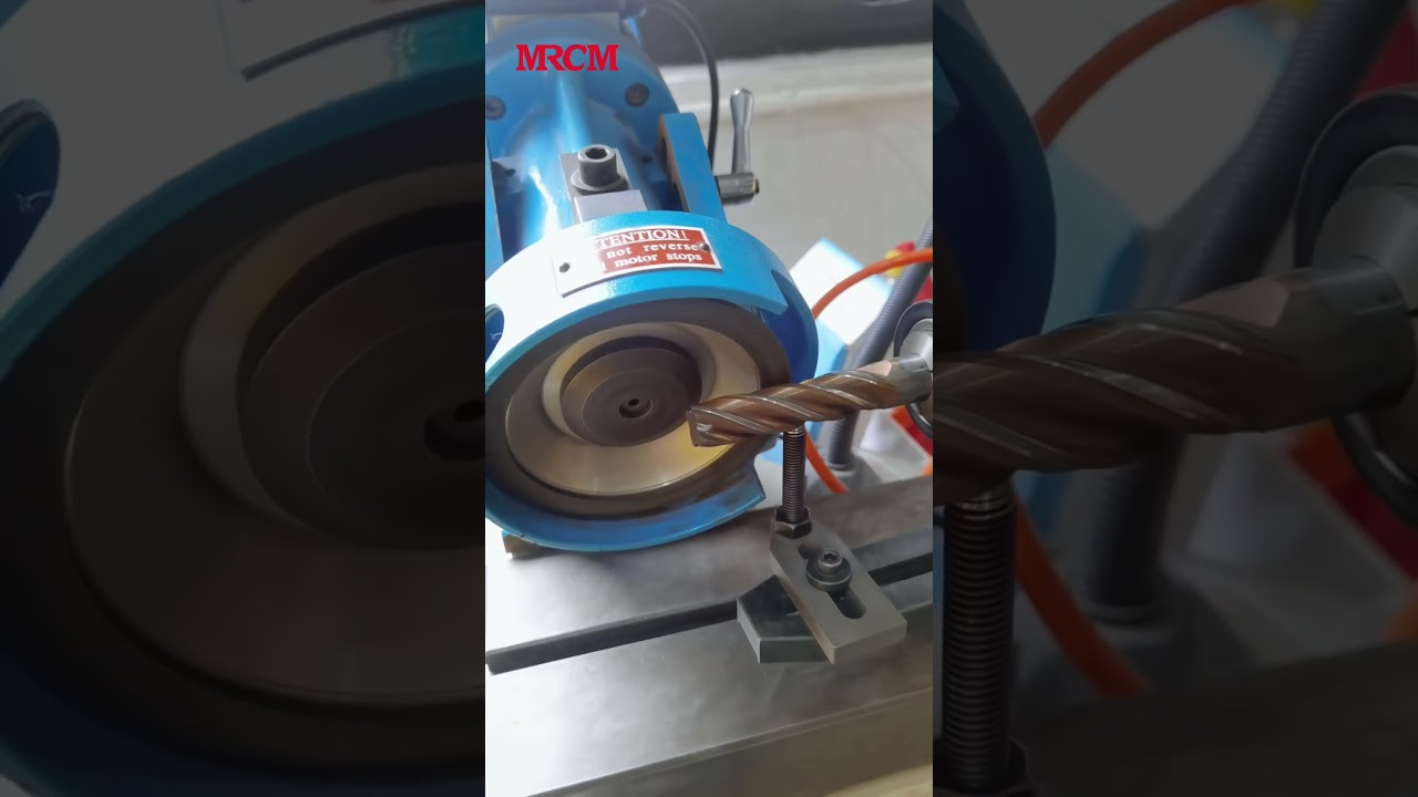 Universal end mill grinding machine with pneumatic 