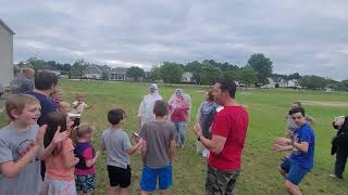 The boys won, so the ladies get a pie in the  face at AWANA