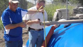 Installing Aqua-Barrier Flood Protection