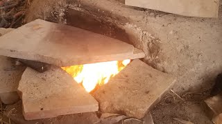 Earthship Tested through extreme cold -35°F. Rocket stove, minimum wood still grows fruit trees.