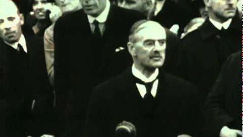 Neville Chamberlain returns from Germany with the Munich Agreement