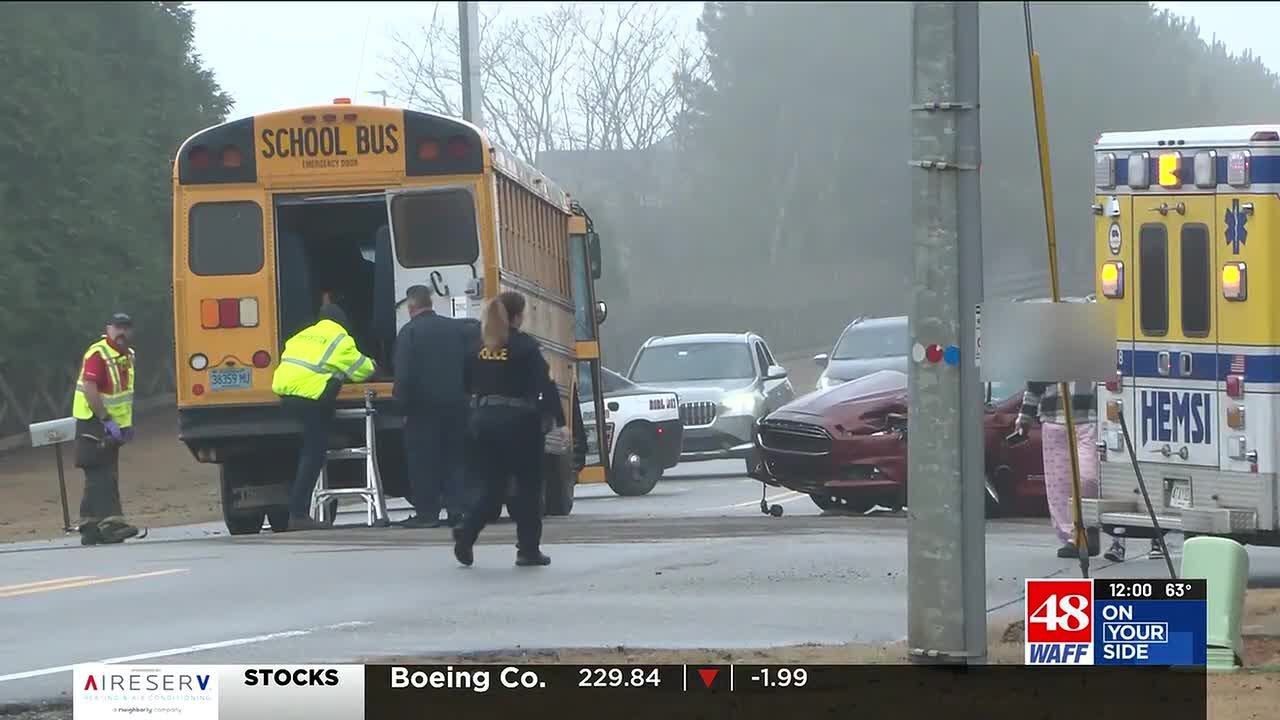 Emergency officials respond to a multi-vehicle accident involving school bus