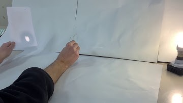 Forming a real image (diminished) with a converging/convex lens