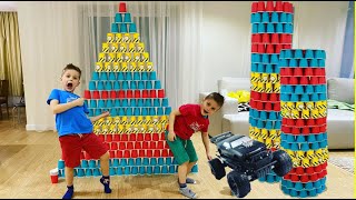 We destroy GIANT towers from color cups // KiFill boys
