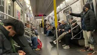 “Bed spacers” in New York City subway train.