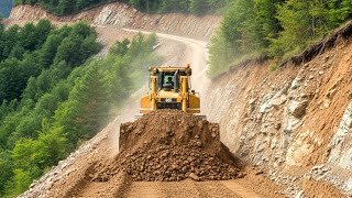 Download Lagu Bulldozer skillful clearing mountain path steep hillside road construction with heavy machinery MP3 Download Lagu Bulldozer skillful clearing mountain path steep hillside road construction with heavy machinery MP3