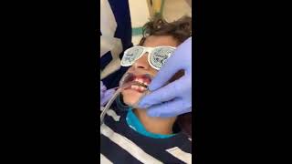 Dr. Murthy Places Braces on his Son!
