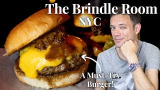 Eating The Burger At The Brindle Room. A Must-Try Burger In Nyc
