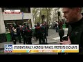 Riot police CONFRONT student protesters in France as clashes escalate