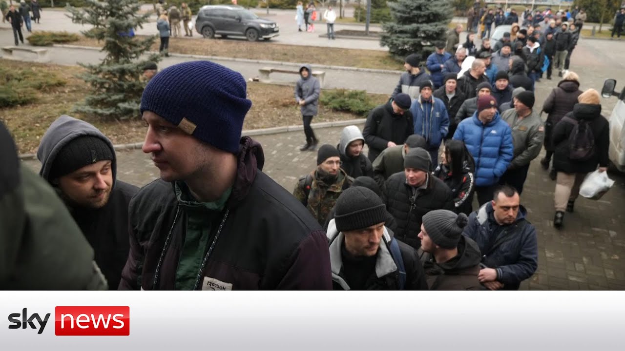 Ukraine Invasion: Volunteers queue to join Ukrainian army