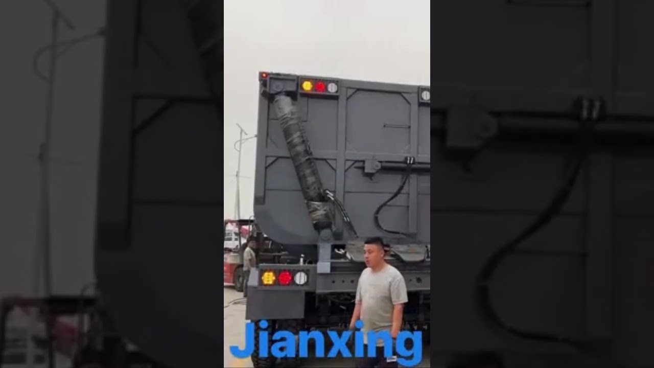 Jianxing 3 axle side dump trailer 