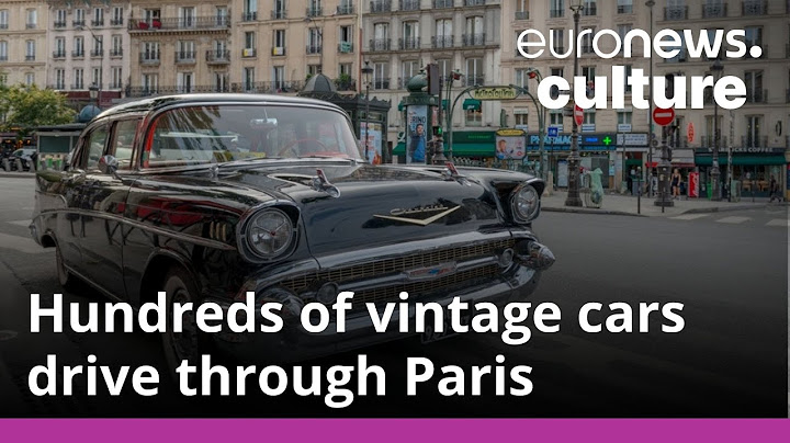 Crossing of Paris: Hundreds of vintage cars parade through the streets of Paris