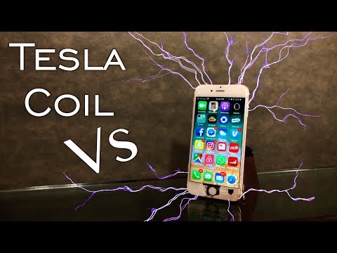 TESLA COIL VS iphone (250,000 VOLTS!)