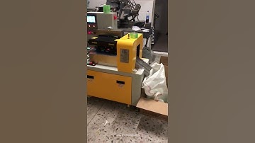 Empty bottle cap box manual loading feeding automatic pillow type bag packaging machine