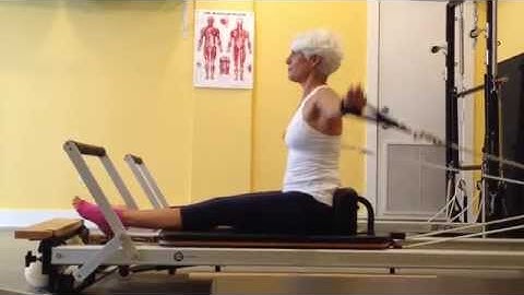 How to do Pilates: Front Rowing - Arm Circles on the Reformer