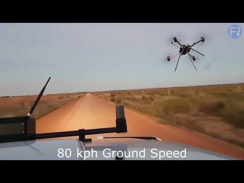 Callisto 50 with FSO Beacon Test Flight - flying in formation with the car