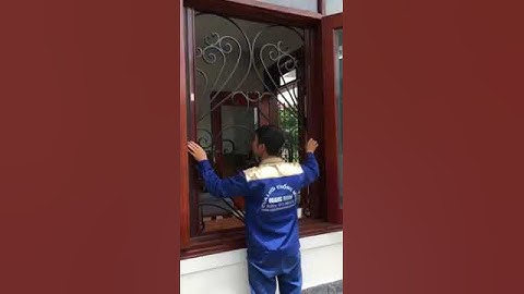 Cửa lưới chống muỗi dạng xếp 2 bên khung nhôm màu vân gỗ - Cửa chống côn trùng.