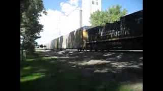 EBD Union Pacific Railroad #5651 with SP patch Autorack train roars thru Lodgepole, Ne  9/20/13