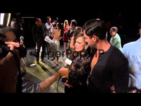 Karina Smirnoff and Maksim Chmerkovskiy  being interviewe...