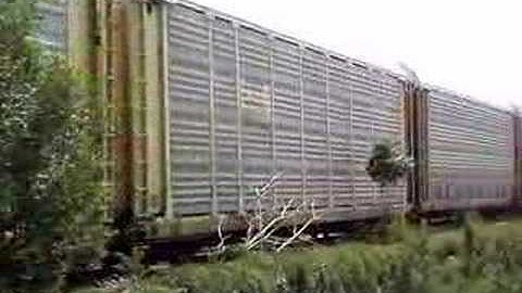 NS ES40DC #7574 leads Autotrain South, Joliet IL.