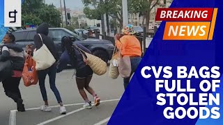Women caught on video allegedly bolting from CVS with bags full of stolen goods