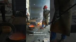 This is a 500kg medium-frequency copper melting furnace during the pouring process.