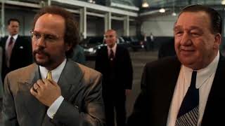 Analize this 1999 Ben & Jelly attend the Mafia Meeting scene