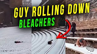 Guy Rolling Down Bleachers of Red Rocks in Snow