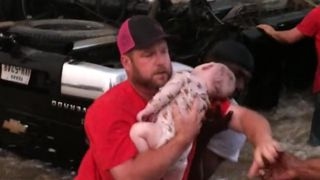 Kids pulled from flipped car in dramatic water rescue
