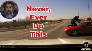 Officer Jumps On Car Hood To Stop A Fleeing Felon