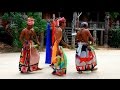 Dayak village in the middle of Kalimantan (Borneo), Indonesia. Traditional dance and music video.