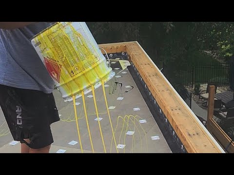 How we apply industrial glue to a fully adhered roof. - YouTube
