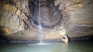 Cavers Climb Waterfall To Find Ancient Cat Paws, Snake Fossils, And Magic Crystals