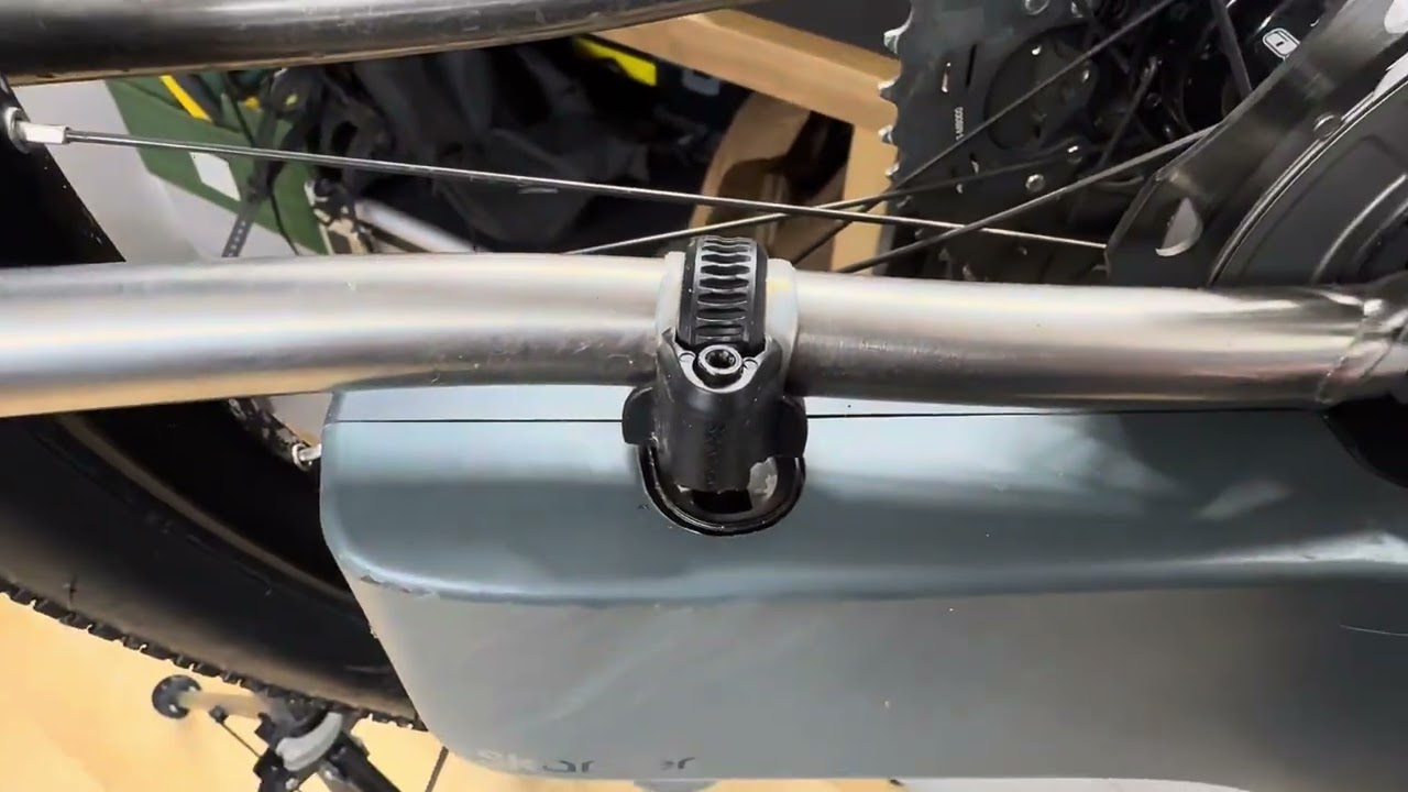 Skarper e-bike chainstay latch detail