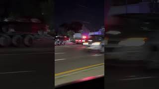 2 Nassau County police cars on a traffic stop