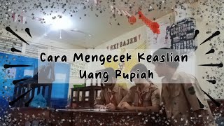 V.5.Cara mengecek keaslian uang Rupiah.I.28