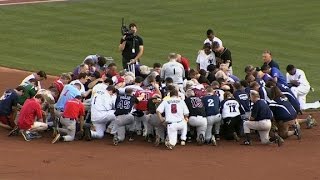 Teams pray before baseball game
