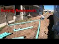 Burying Downspouts And Cutting A Swale Between Two Duplexes