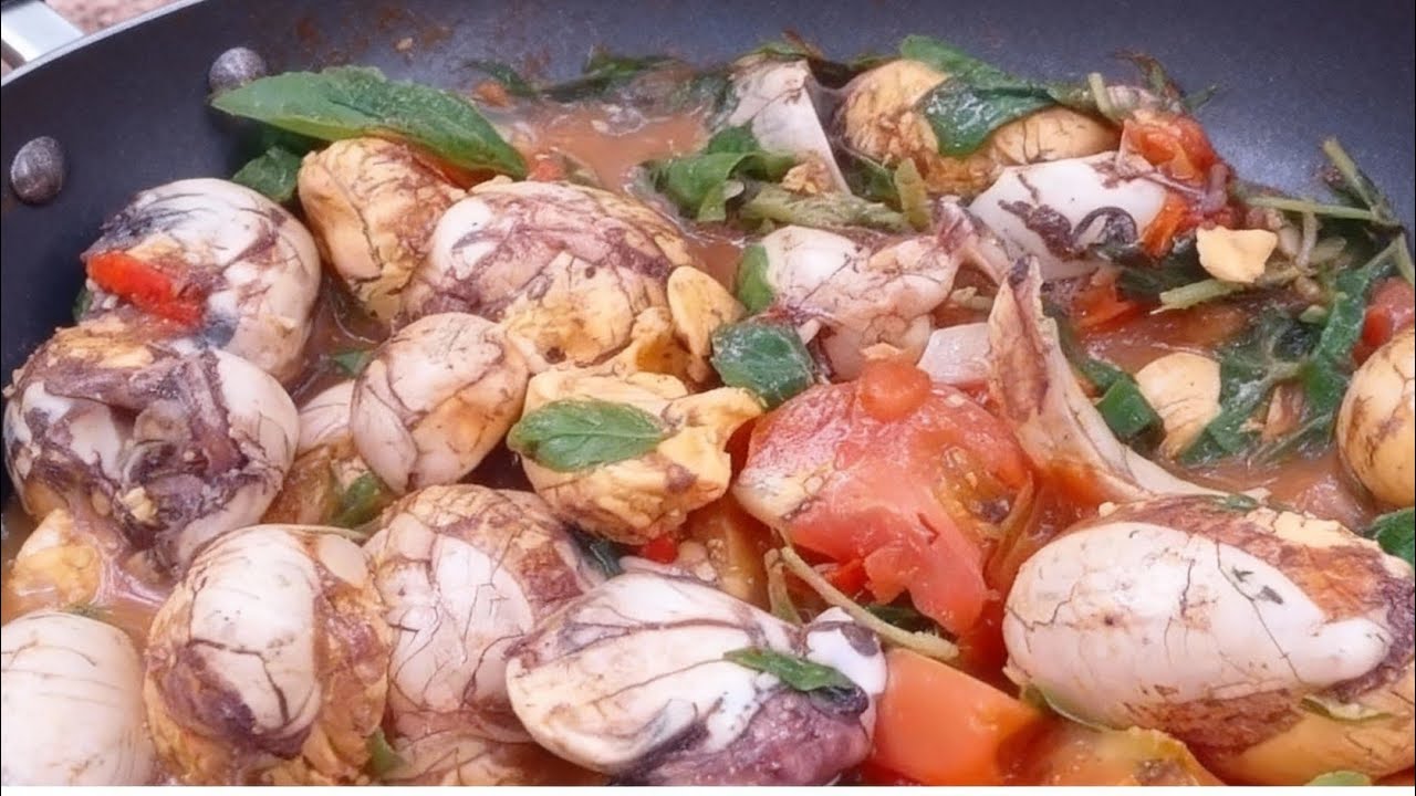 Primitive Cooking Fertilized Eggs Over an Open Fire