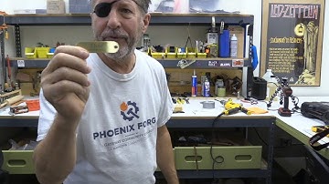 010 Install rivet on nameplate on dog collar.mp4